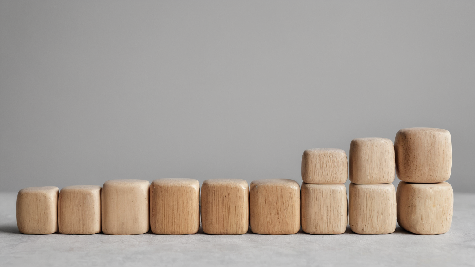 Wooden blocks representing a sequence of retirement-loan repayments